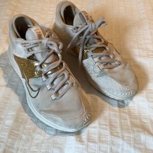 Nike Women's White and Gold Sneakers. Size 8.5